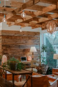 wood paneled living room - rustix